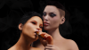 Alice and Katie smoke cigar.png