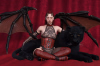 Sarah (Succubus) sitting with a panther (newer version with makeup_cropped_color_correction).png