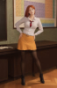 01065-3363671156-a woman in a skirt and shirt and red hair standing in front of a blackboard w...png