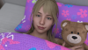 Tessa bed_lying_pov_smile.png